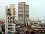 Sensex, Nifty gain on Monday as oil eases