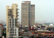Sensex, Nifty gain on Monday as oil eases